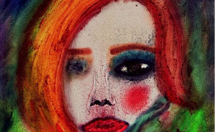 Dettaglio di un opera raffigurante un volto di donna